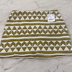 Zara boho geometric print mini skirt with metallic accents, size small, NWT